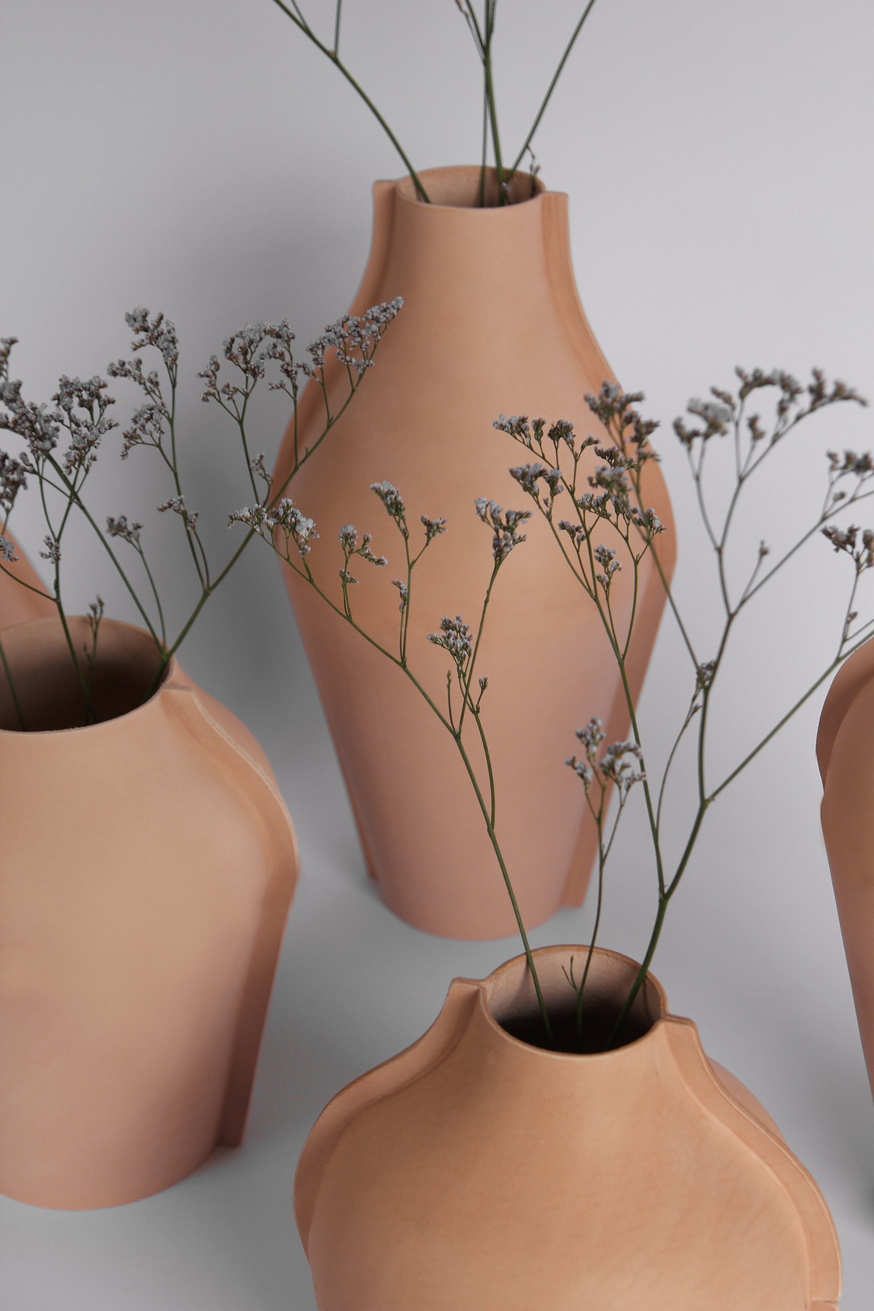 Talia Luvaton leather vases